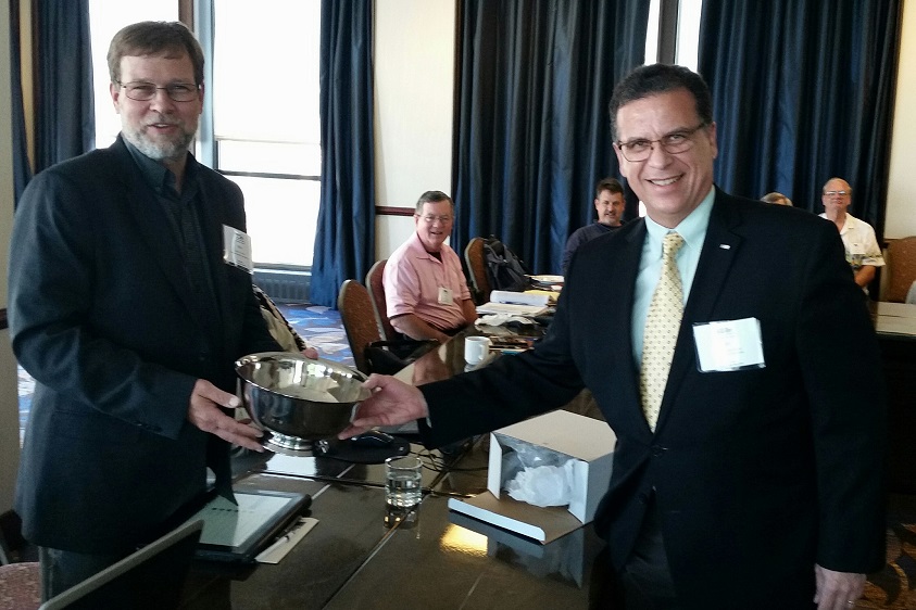 Mike Schuller accepts the 2015 Scalzi Research Award from Dr. Art Schultz, Chairman of the Research Committee.